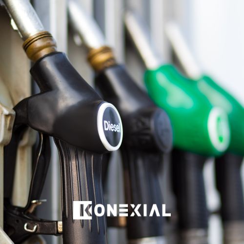 Fuel nozzles lined up at a gas station