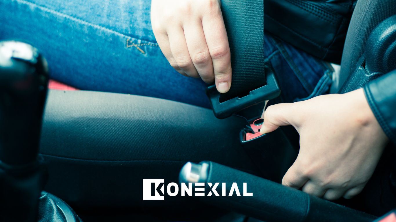 Person buckling seat belt
